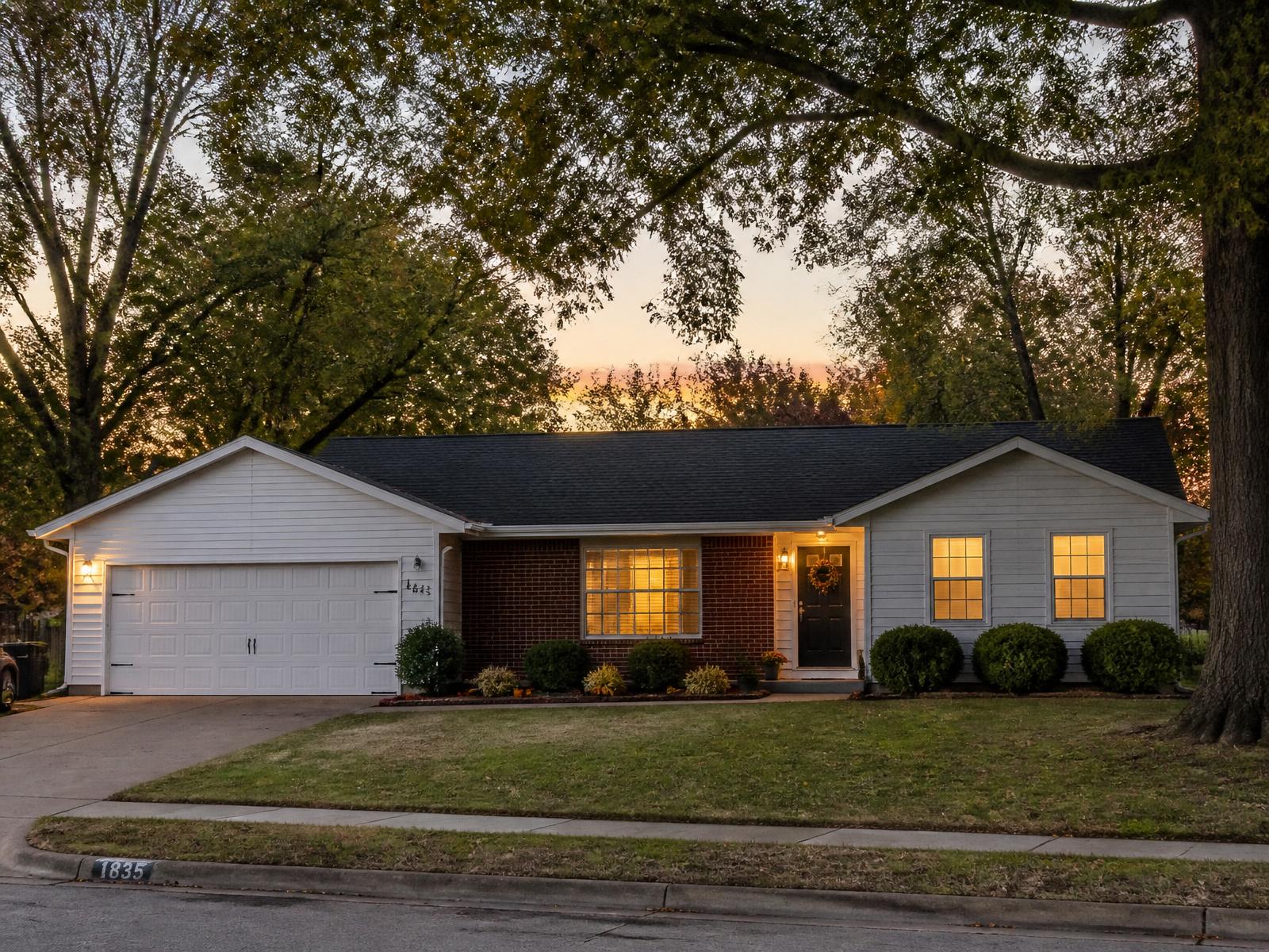 A well-kept southwest Missouri home at dusk